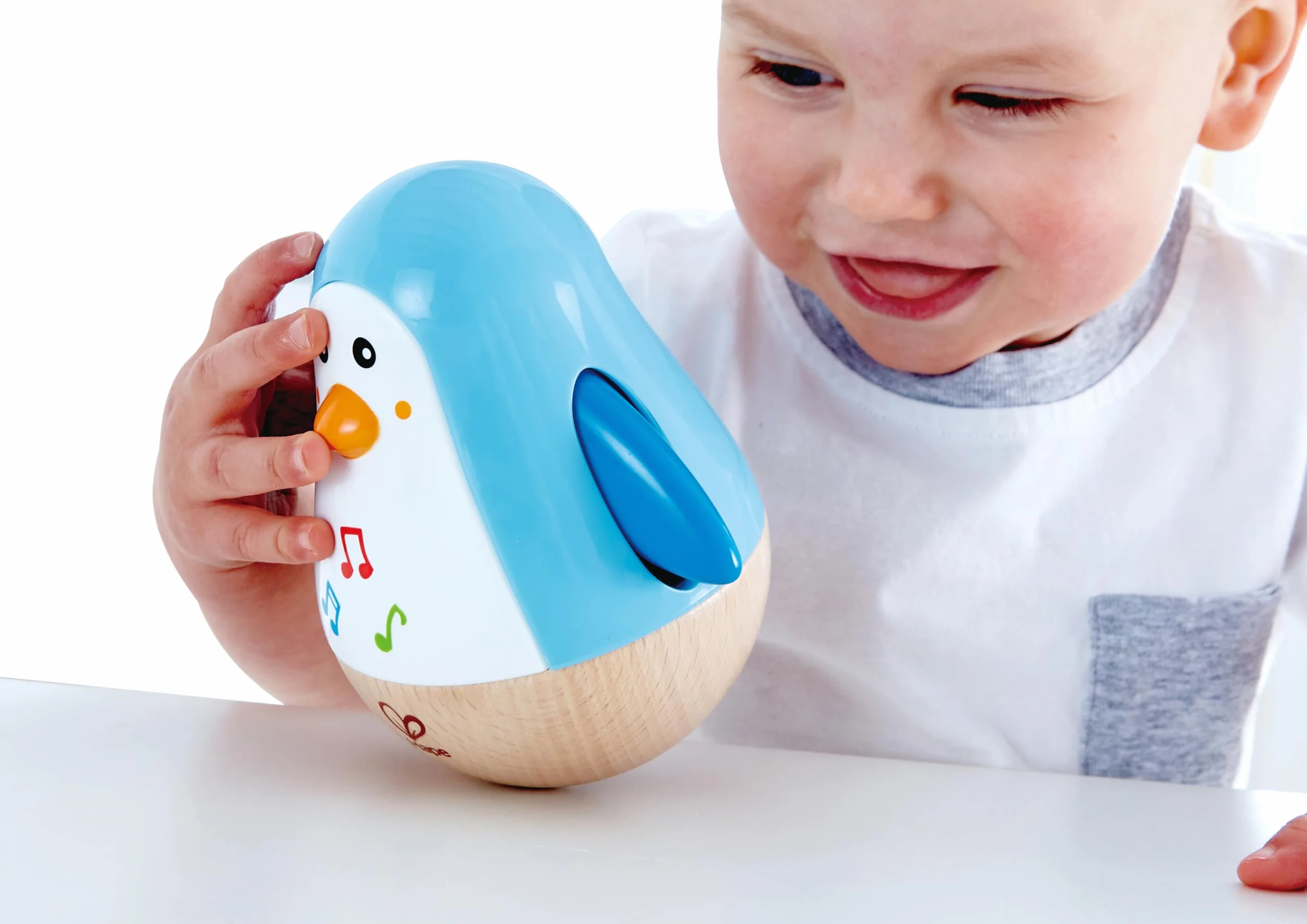 Hape Penguin Musical Wobbler, Colourful Wobbling Melody, Roly-Poly Toy for Kids 6 Months+