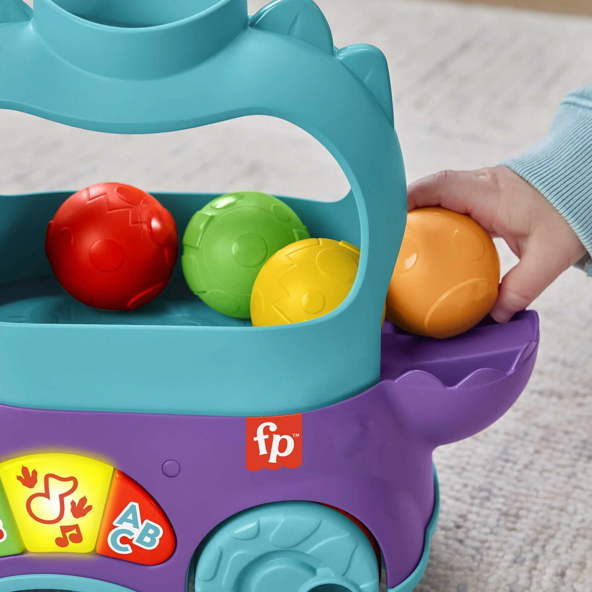 Fisher-Price Dinuś Podskakujące piłeczki Edukacyjna zabawka do ciągnięcia dla niemowląt i starszych dzieci, z treściami Poziomy nauki z możliwością wyboru języka, HNR51