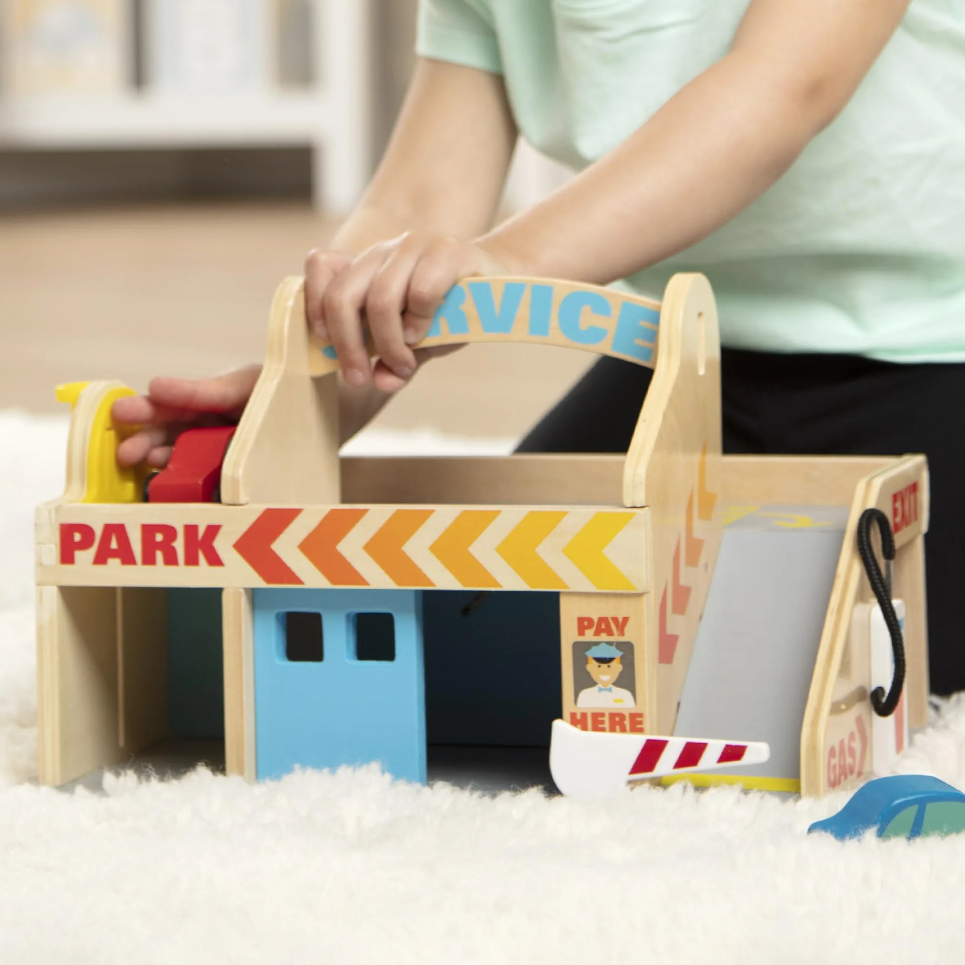 Melissa & Doug – stacja obsługi samochodów z parkingiem piętrowym (pojazdy, funkcjonalna winda, łatwe przenoszenie)
