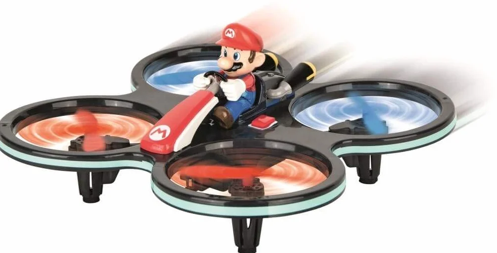 Carrera 370503024 RC Mini Mario-Copter, czerwony/czarny │ zdalnie sterowany helikopter elektryczny do użytku wewnątrz i na zewnątrz, z zapasowymi łopatkami wirnika i pilotem zdalnego sterowania,