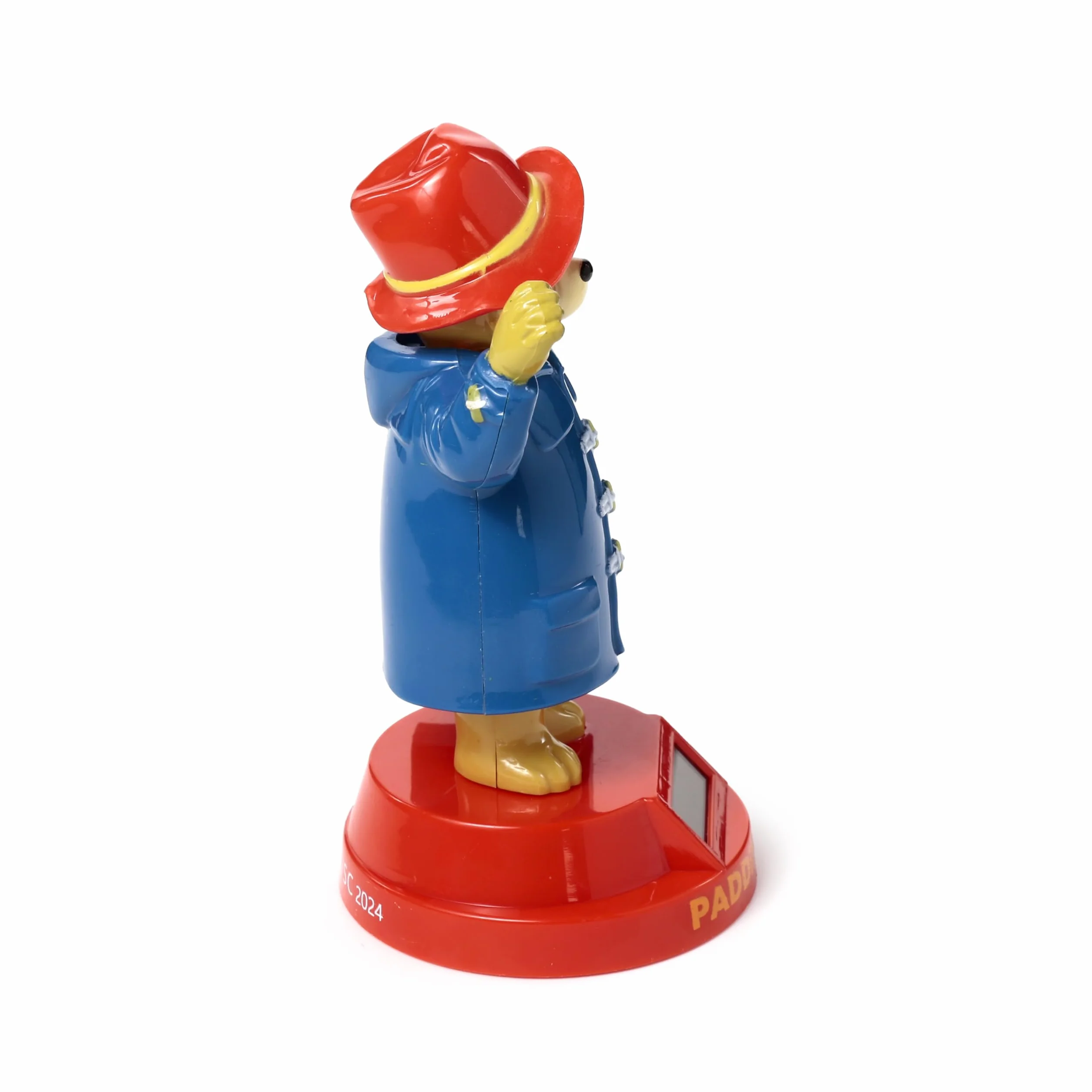 Paddington nied?wied? solarna figurka ko?ysz?ca si?, niebieski p?aszcz, czerwona podstawa